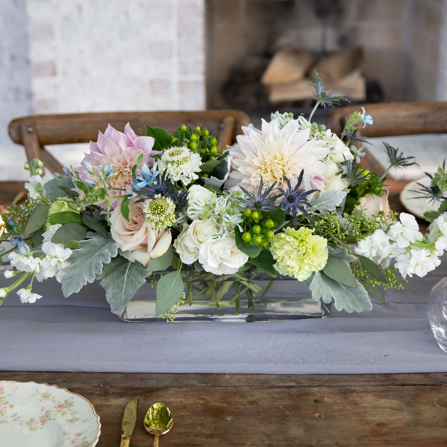 46 & Spruce glass rectangle vase 11 3/4 x 4 x 4 1/2 inch, beautifully showcasing a floral centerpiece arrangement, perfect for elegant table settings.