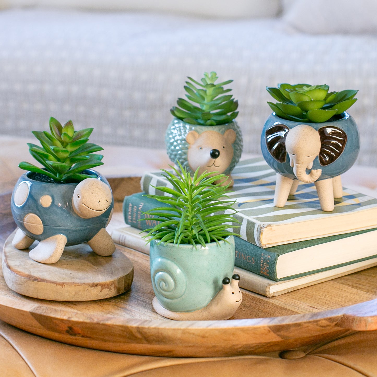 variety of animal ceramic vases on a table