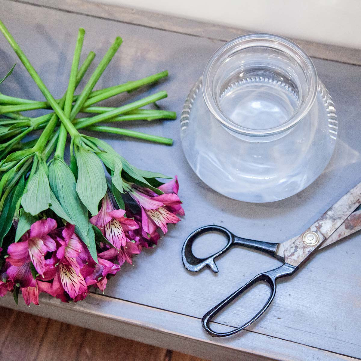 crystal rosie posie vase shown with scissors and alstroemeria