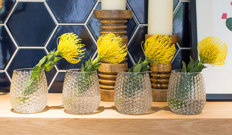 Pincushion protea in pebblestone vases