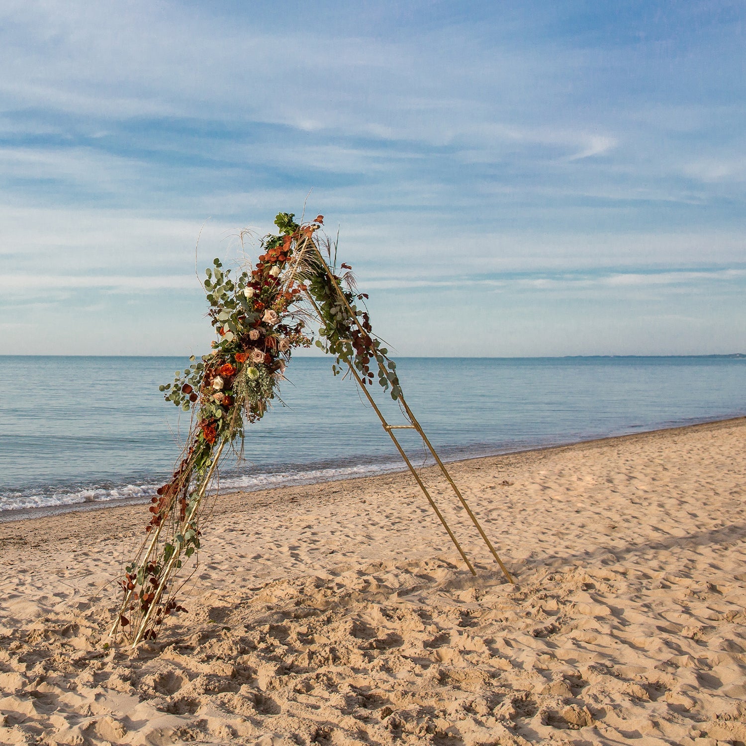 Triangular wedding arch on a beach - 46 & Spruce